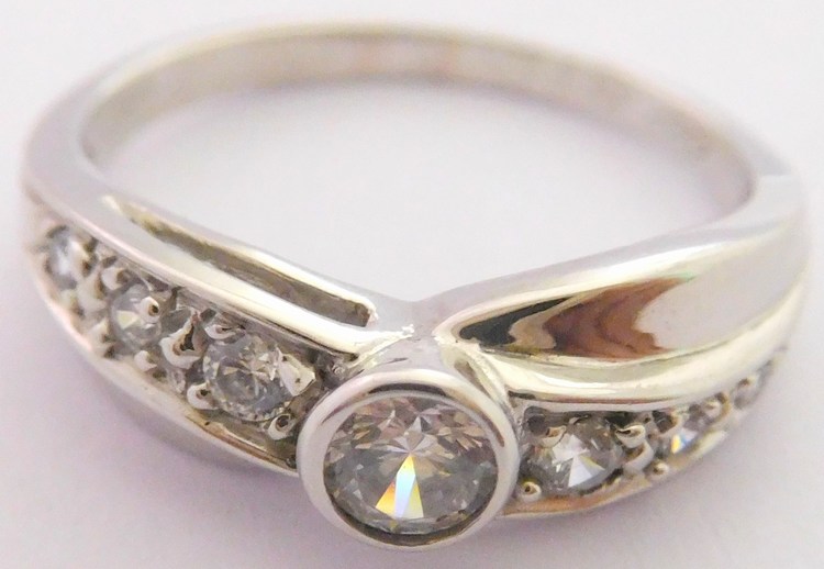 Klenoty Budín Zásnubní prsten z bílého zlata se zirkony 585/2,69gr vel.53 HK1067