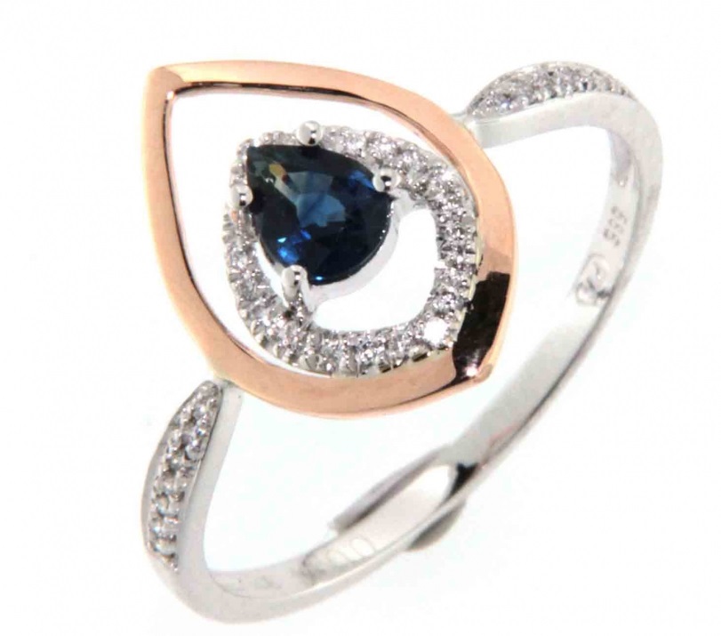 Zásnubní prsten s diamantem s modrým safírem z bílého zlata s červenou úpravou