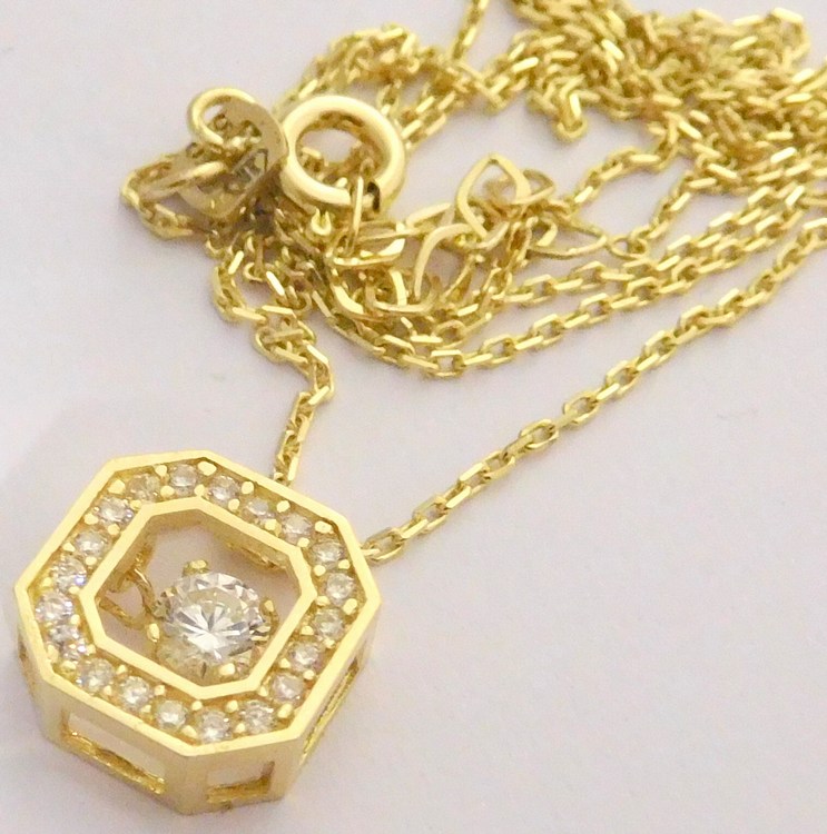 Klenoty Budín Zlatá souprava ze žlutého zlata s pohybujícím se kamínkem (přívěsek) 585/2,32gr 42-45cm HK4005