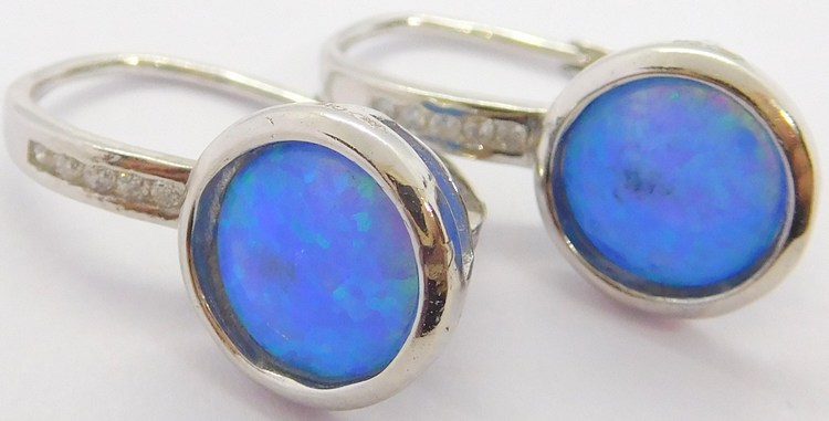 Klenoty Budín Rhodiované stříbrné náušnice s modrými opály 925/1000 030602400004