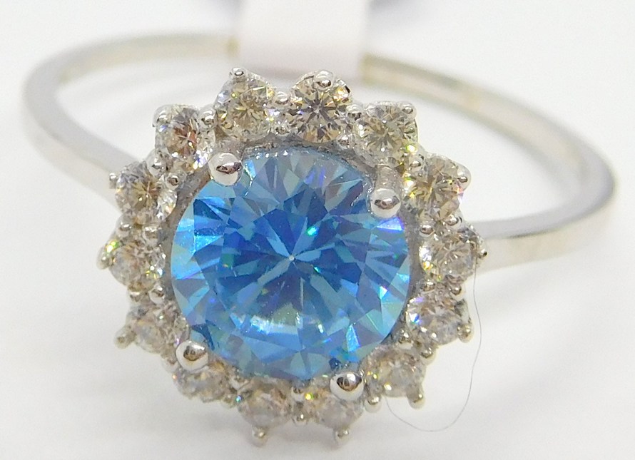 Klenoty Budín Mohutný zásnubní zlatý prsten z bílého zlata se zirkony a modrým topazem 585/2,12gr vel. 59 H280