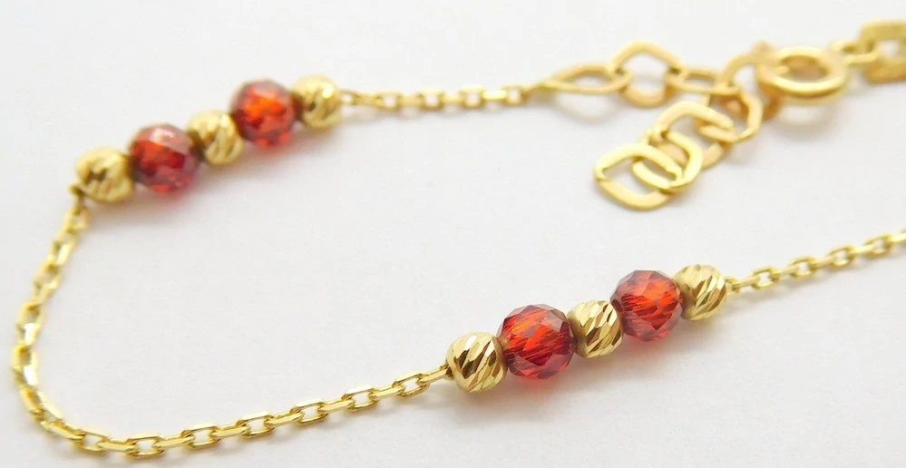 Klenoty Budín Dámský gravírovaný zlatý náramek na nohu s červenými rubíny 585/2,08gr 26-28,50cm HK7113