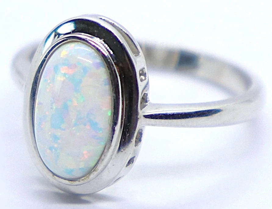 Klenoty Budín Dámský prsten z bílého zlata s velkým bílým opálem 585/2,70gr vel. 51 HK1246