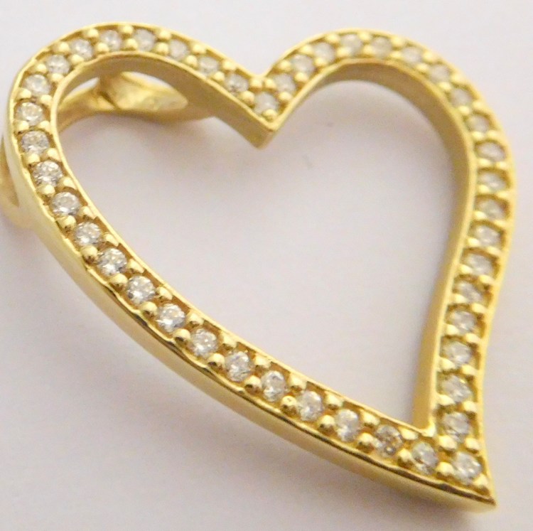 Klenoty Budín Obrovské zlaté srdce poseté mnoha zirkony 585/2,99gr HK3006