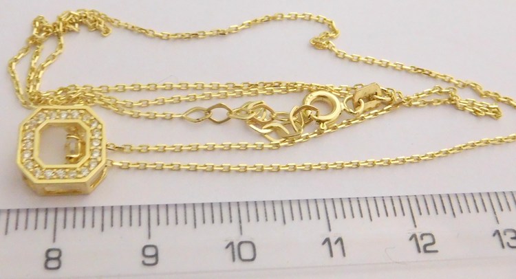 Klenoty Budín Zlatá souprava ze žlutého zlata s pohybujícím se kamínkem (přívěsek) 585/2,32gr 42-45cm HK4005