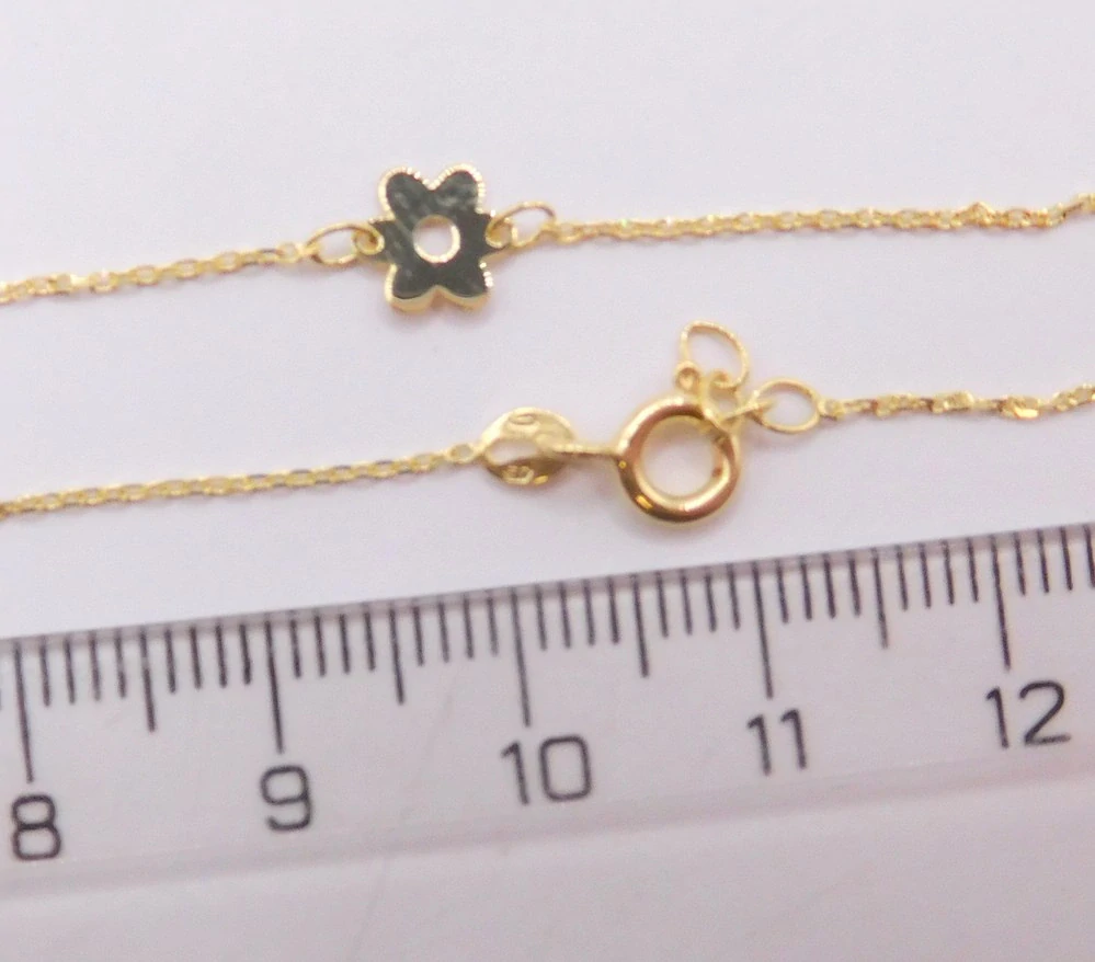 Klenoty Budín Dámský zlatý náramek ze žlutého zlata s květinkou 585/0,67gr 17+1cm HK7154