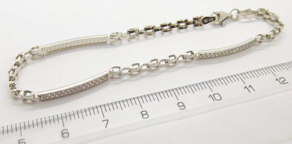 Klenoty Budín Mohutný dámský náramek z bílého zlata se zirkony 585/5,00gr 19cm HK7029