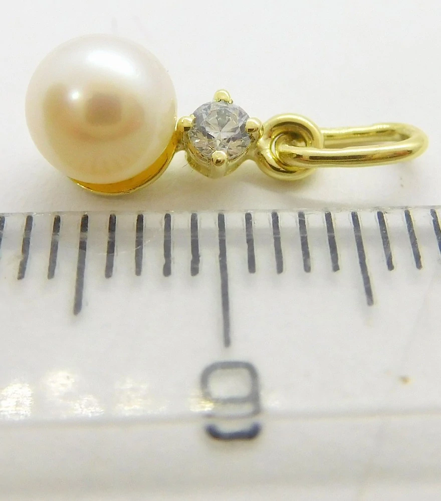 Klenoty Budín Zlatý přívěsek s bílou perlou a zirkonem 585/0,65gr 245040064