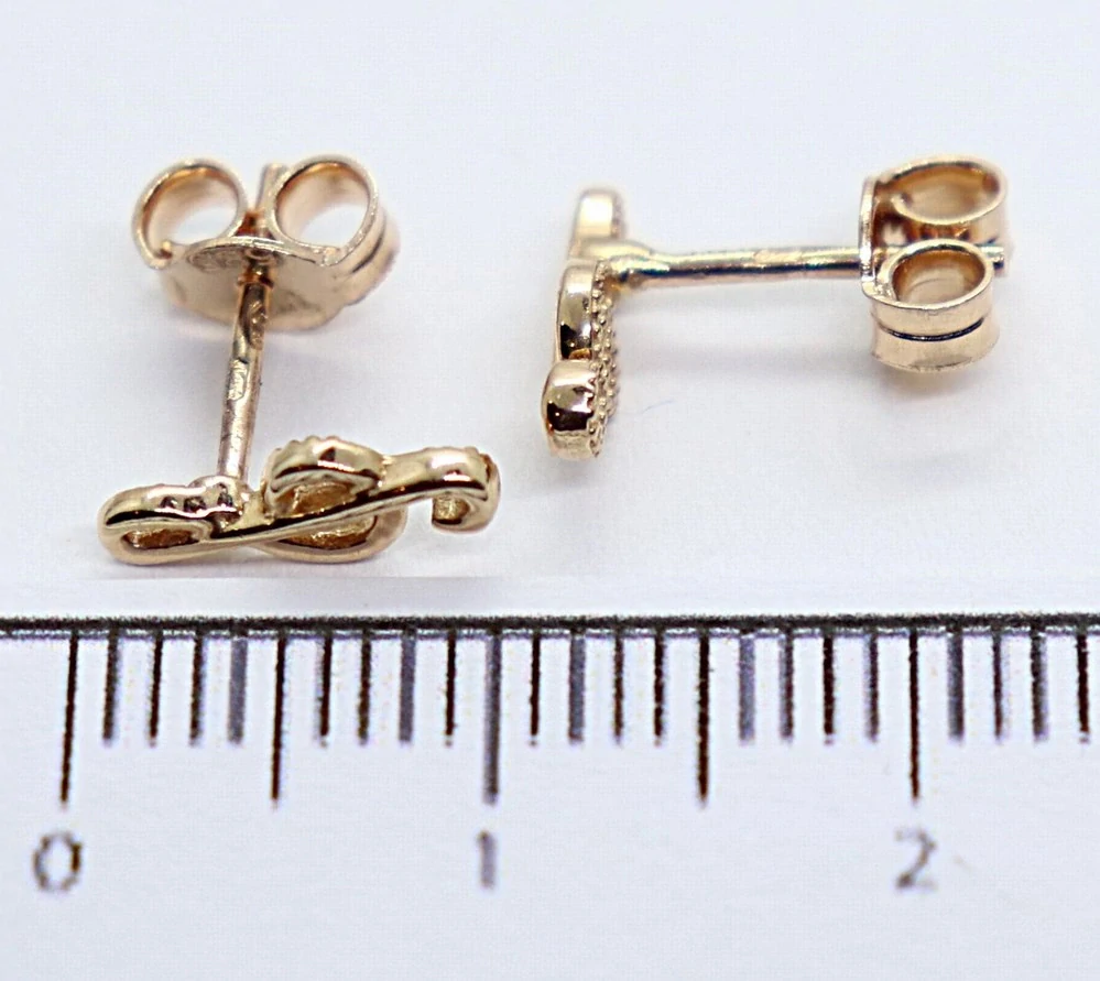 Klenoty Budín Dámské peckové zlaté náušnice z růžového zlata na puzetku houslový klíč 585/1,00gr HK2355