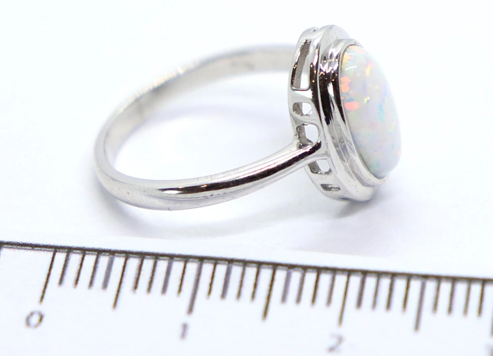 Klenoty Budín Dámský prsten z bílého zlata s velkým bílým opálem 585/2,70gr vel. 51 HK1246