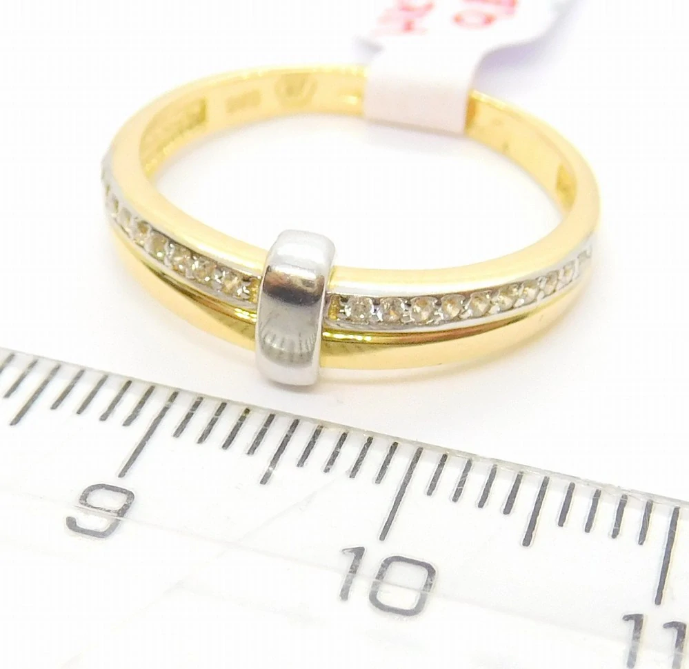 Klenoty Budín Mohutný dámský zlatý prsten se zirkony z bílého a žlutého zlata 585/3,05gr vel. 59 HK1189