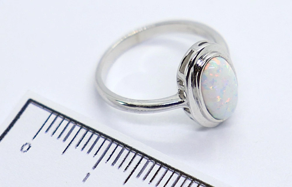 Klenoty Budín Dámský prsten z bílého zlata s velkým bílým opálem 585/2,70gr vel. 51 HK1246