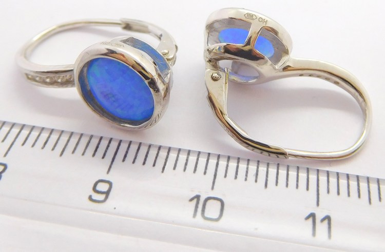 Klenoty Budín Rhodiované stříbrné náušnice s modrými opály 925/1000 030602400004