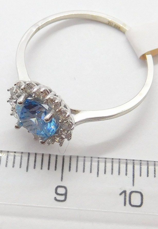 Klenoty Budín Mohutný zásnubní zlatý prsten z bílého zlata se zirkony a modrým topazem 585/2,12gr vel. 59 H280