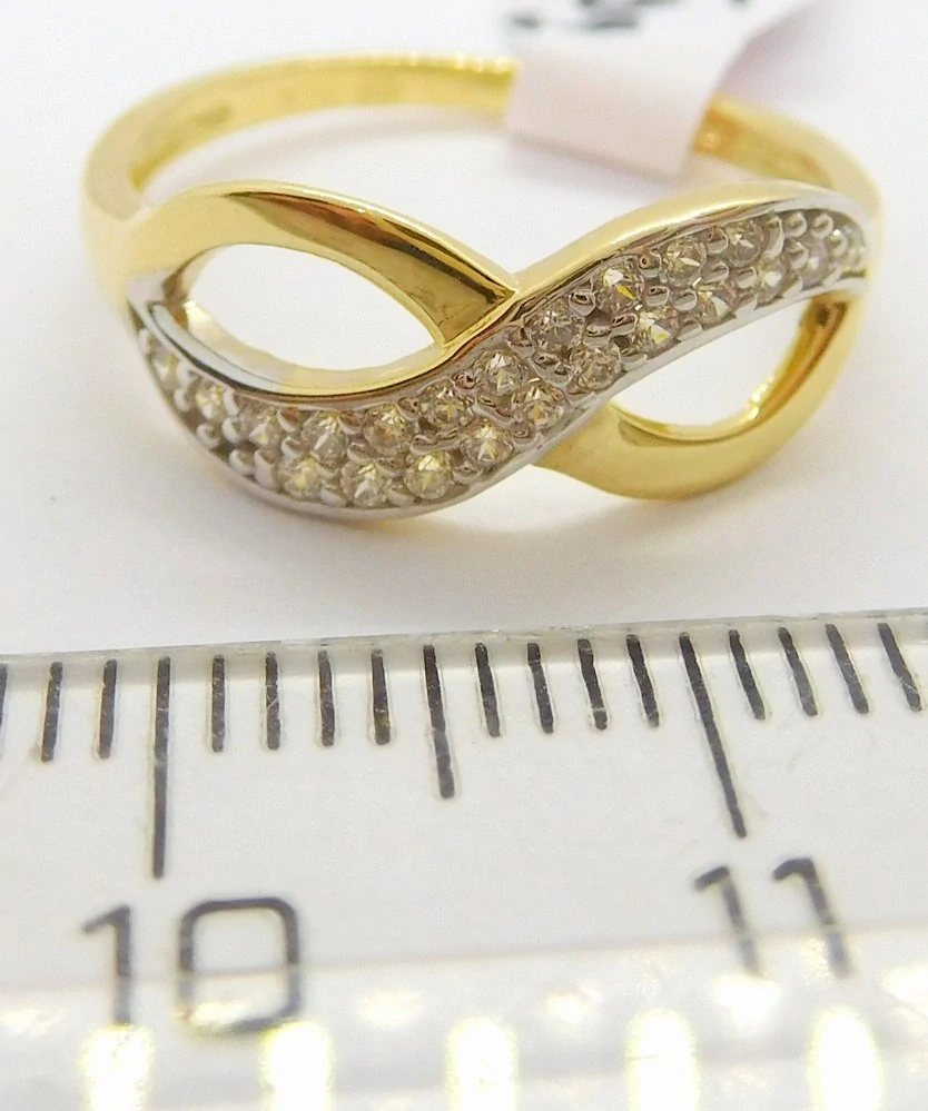 Klenoty Budín Dámský prsten ze žlutého zlata se zirkony nekonečno 585/1,82gr vel. 52 HK1174