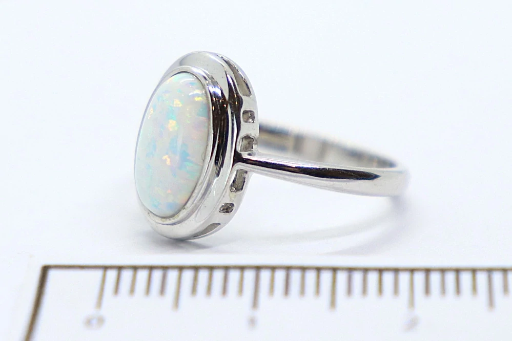 Klenoty Budín Dámský prsten z bílého zlata s velkým bílým opálem 585/2,70gr vel. 51 HK1246