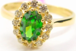 Klenoty Budín Dámský zlatý prsten se zirkony a velkým zeleným smaragdem 585/1,98gr vel. 54 HK1154
